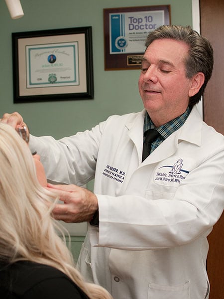 Dr. Grazer with a patient